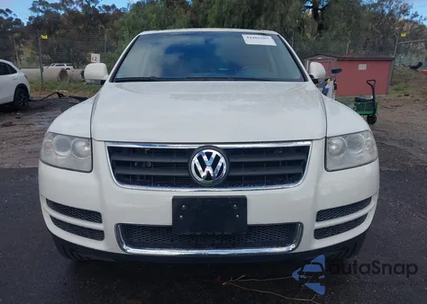 2006 Volkswagen Touareg V8 z USA, uszkodzony, nr VIN WVGZM77L06D027930